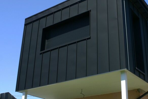 Agrandissement extension ossature bois bardage joint debout Montivilliers Le Havre entreprise Fleury