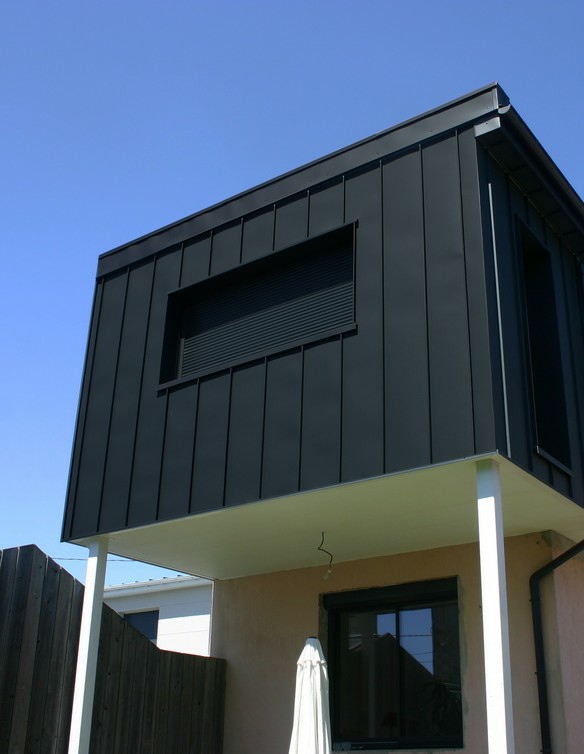 Agrandissement extension ossature bois bardage joint debout Montivilliers Le Havre entreprise Fleury